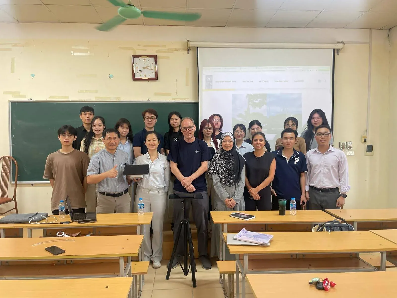 The AirGradient team on-site in Hanoi, Vietnam, alongside the UNDP team and students